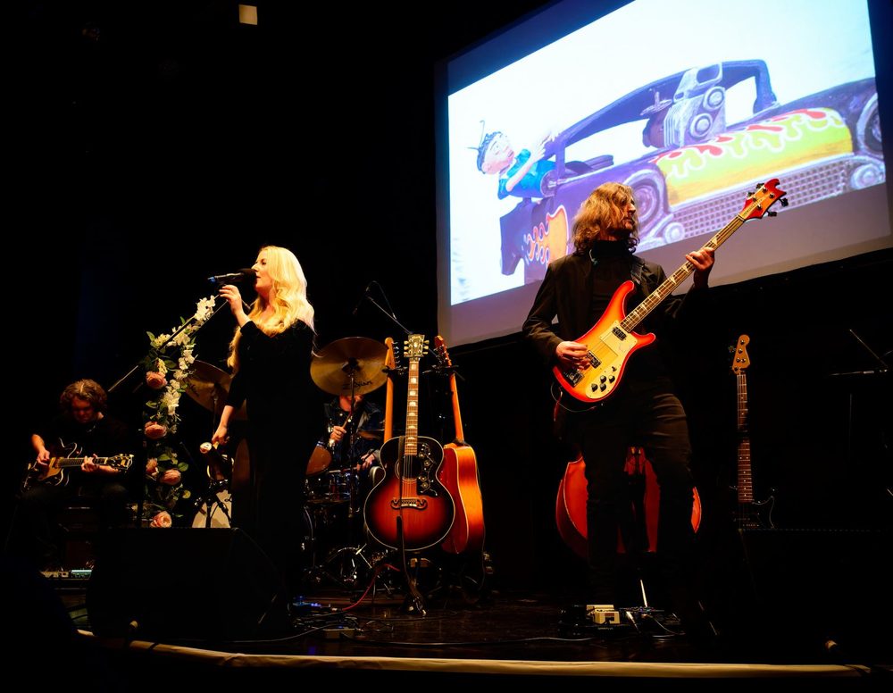 Freddie and the band performing live